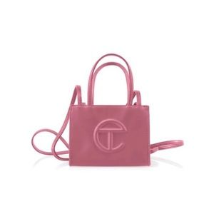 Small Telfar shopping bag new with tags never used NWT corned beef color pink
